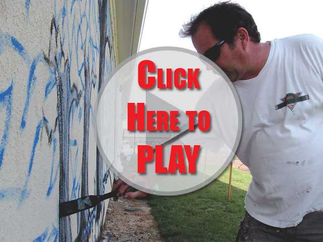 Click to play Painting the town mural