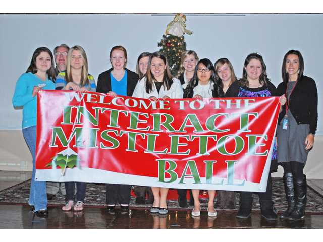 Rockin’ around the mistletoe at ball
