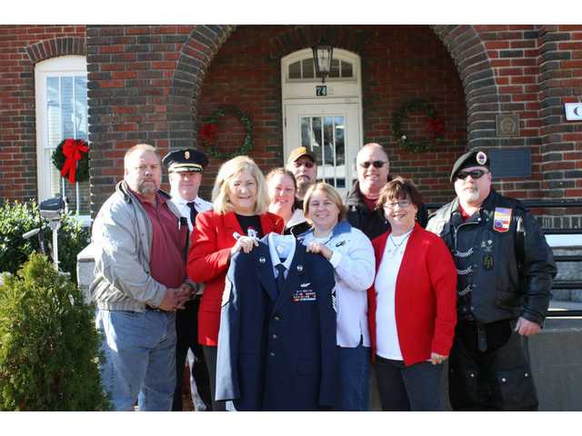 Family donates former POW's uniform