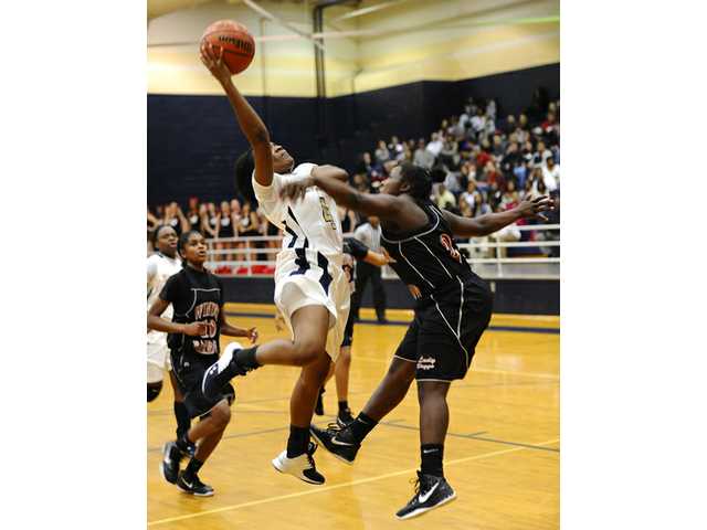 Lady Doggs top host Lady Wildcats