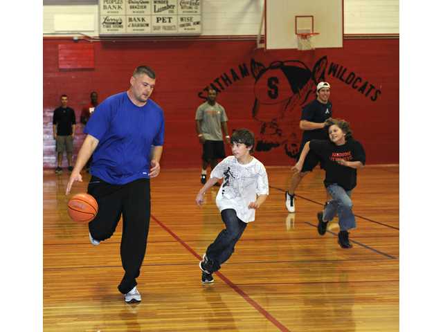 Pro athletes make visit to Statham Elementary