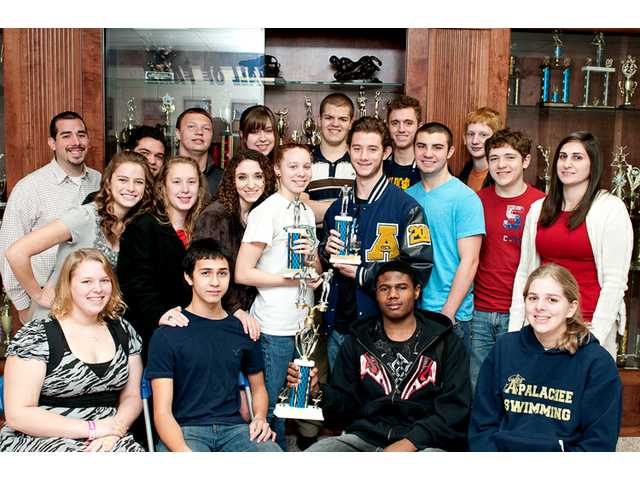 Apalachee swimmers celebrate first trophy Apalachee swimmers celebrate first trophy