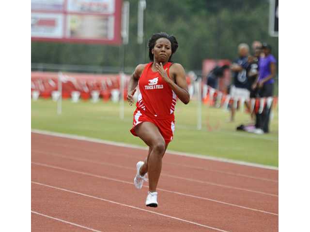 TRACK: Lady Doggs jump out to early lead in region meet