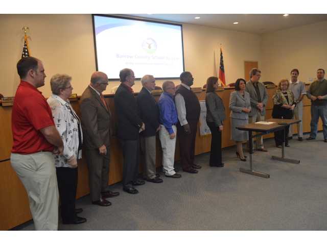 BOE, BOC sign agreement, schools agree to pay fees BOE, BOC sign agreement, schools agree to pay fees