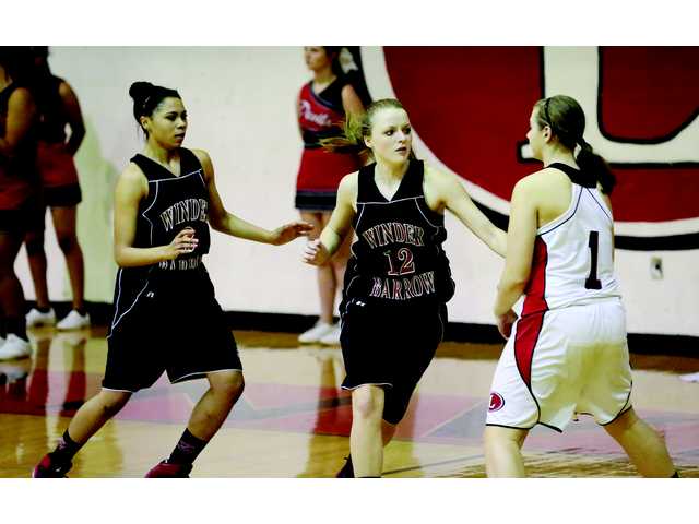 Lady Doggs struggle to score against Lady Devils Lady Doggs struggle to score against Lady Devils