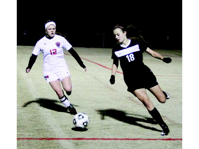 Lady Doggs take a tough hit Lady Doggs take a tough hit
