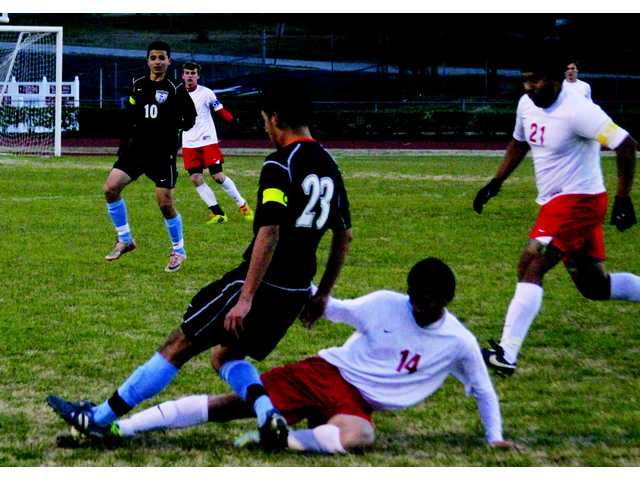 Unbeaten Knights take down Soccer Doggs in frigid battle Unbeaten Knights take down Soccer Doggs in frigid battle