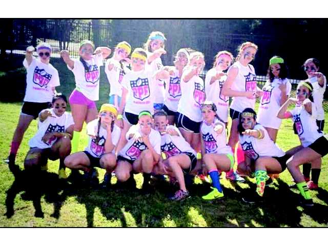 Powder puff game delights students Powder puff game delights students