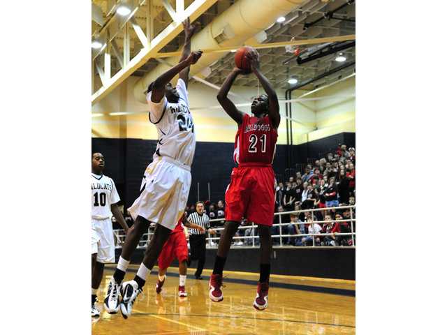 Bulldoggs holds off rival Wildcats Saturday