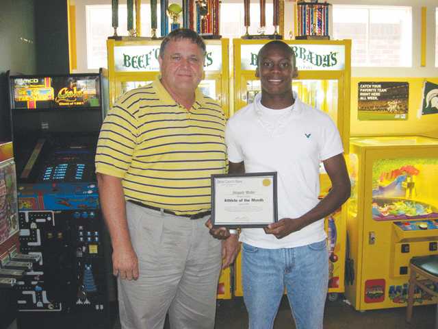 Walker runs way to monthly AoM honors