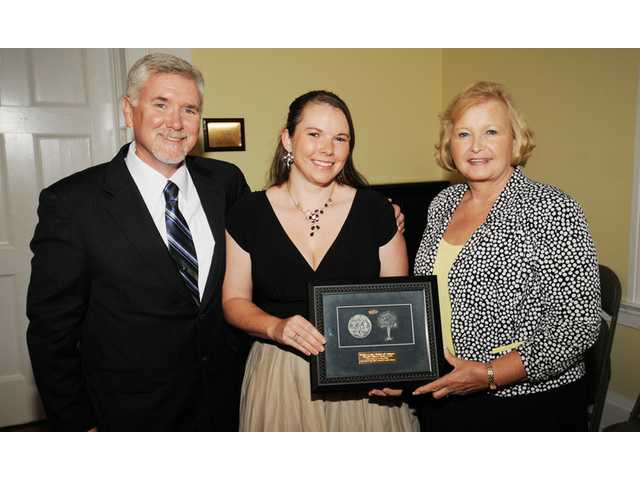Chamber hands President’s Award to Thiel Shull