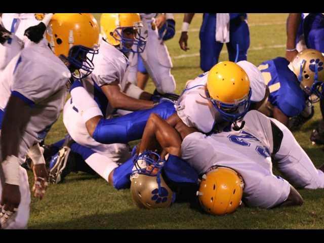 Ugly night for local football teams