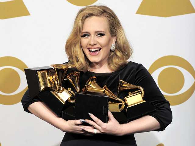 Triumph, tragedy reign at the Grammy Awards