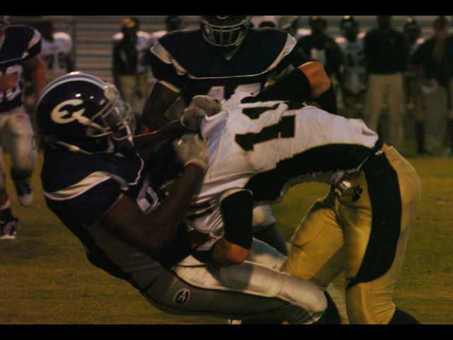 Rebels finish off victory in 2010 home opener
