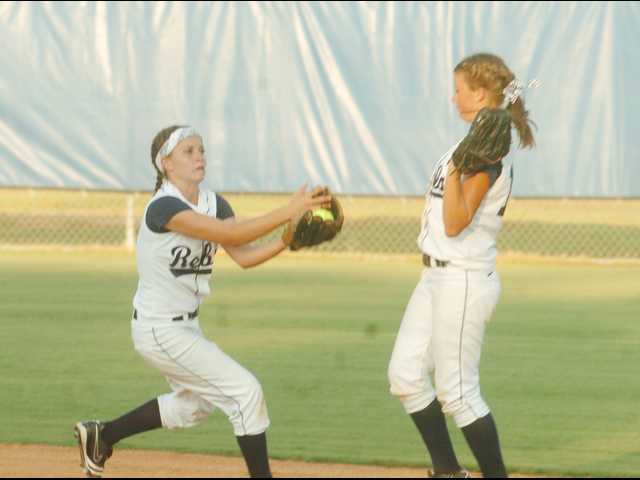 Early offense sparks Lady Rebels past rivals