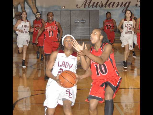 Lady Mustangs step on the gas in victory
