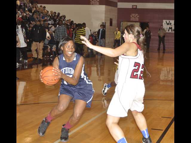 Lady Mustangs hold off Lady Rebels