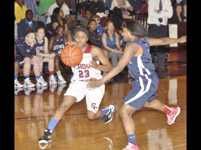 Lady Mustangs hold off Lady Rebels
