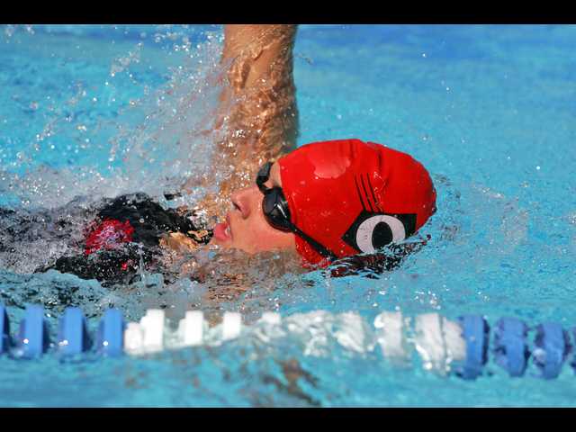 TITLE SPLASH - Mustang Boys, Girls Grab Swimming Championship