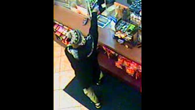 Police search for armed robber