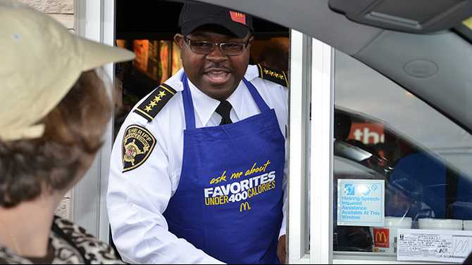 McDonald's puts county, city officials to work