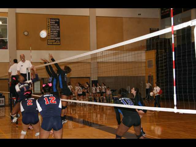 Heritage falls in Elite 8