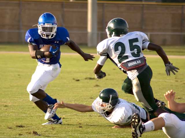 Eastside slips past Heritage