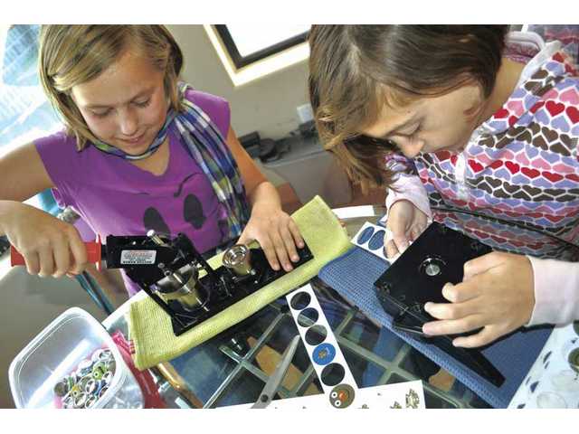 Local girls start button business