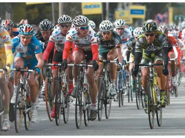 Thousands Line Street to Spot Amgen Cyclists