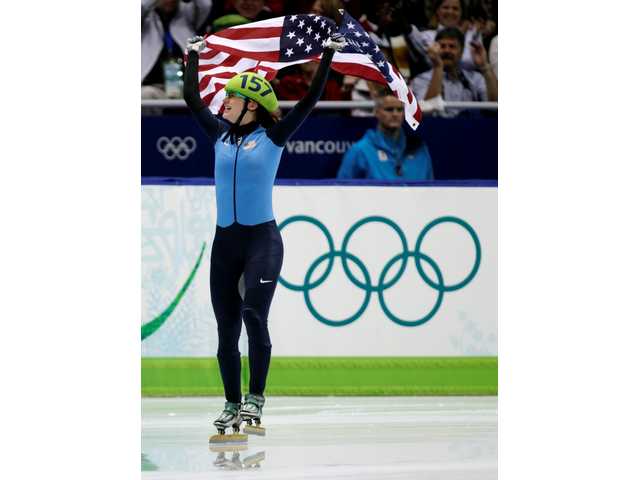 Olympics wrap: US breaks medal record; hockey team in gold game 