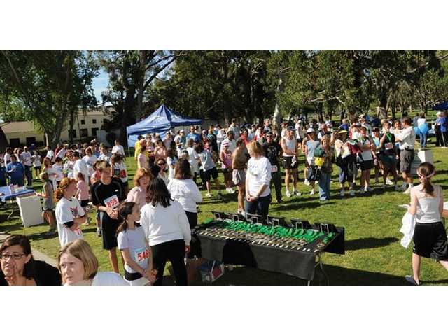 ‘Footsteps’ run helps SCV children
