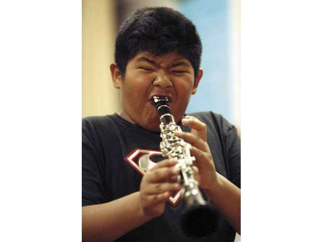 McGrath 3rd-graders try hand at musical instruments