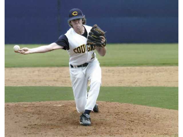 Cougars stay ahead at the top
