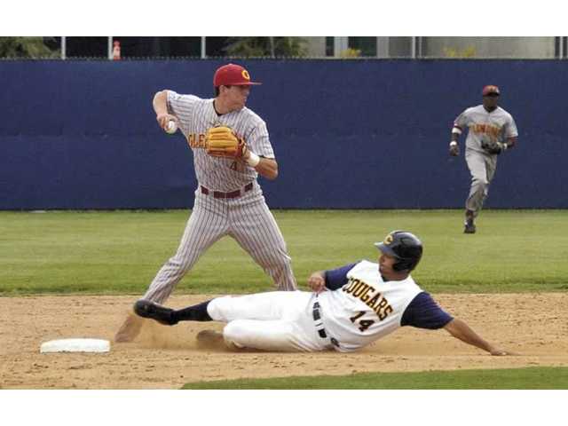 Cougars stay ahead at the top