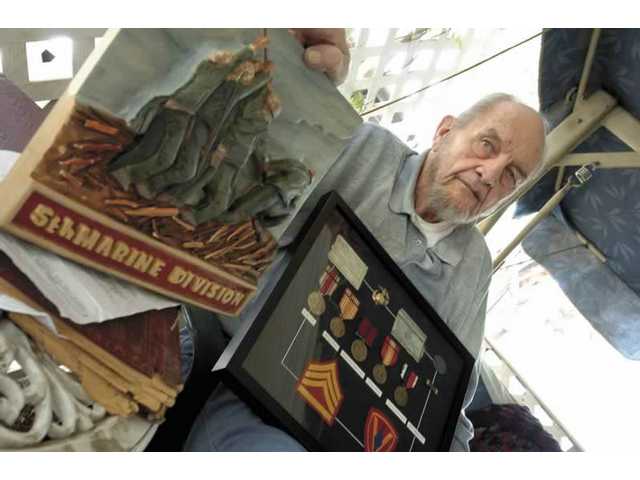 Veterans dept. says ex-marine owes nearly $4,000