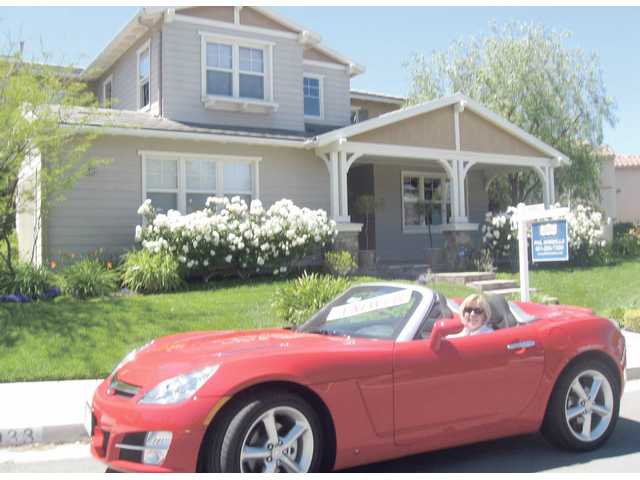 Buy a house, get a car thrown in