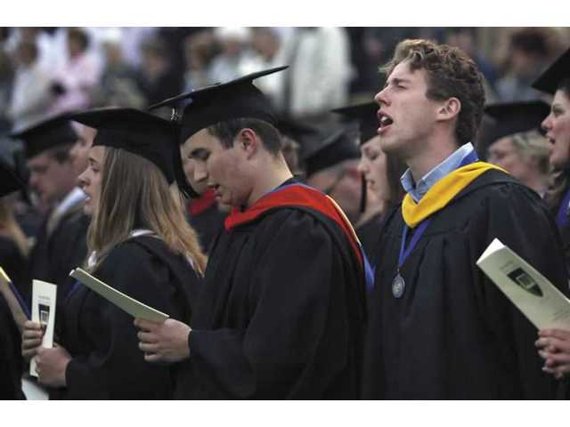 Nearly 300 receive degrees