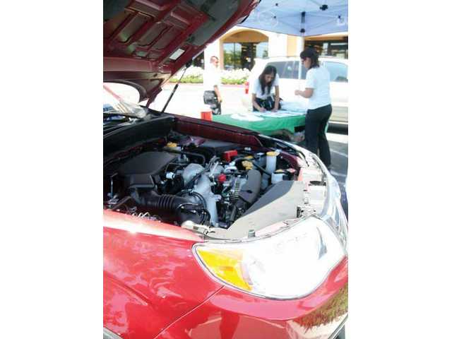Hybrid vehicles on display at Whole Foods
