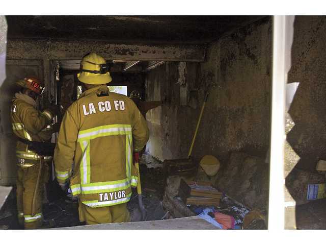 Firefighters keep blaze at complex in check