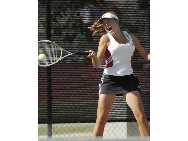 Tennis girls raise a racquet