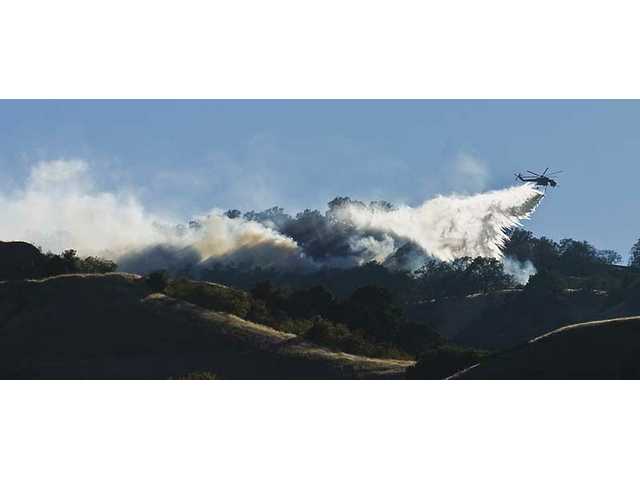 UPDATED: Downed power line sparked wildfire