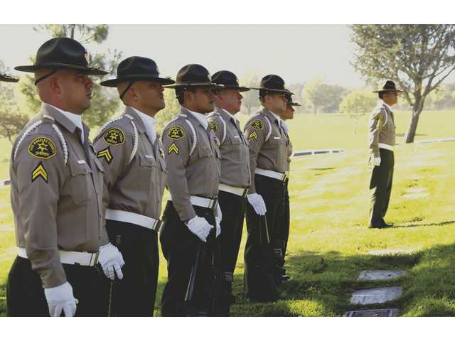 ‘Troops’ honor Henderson