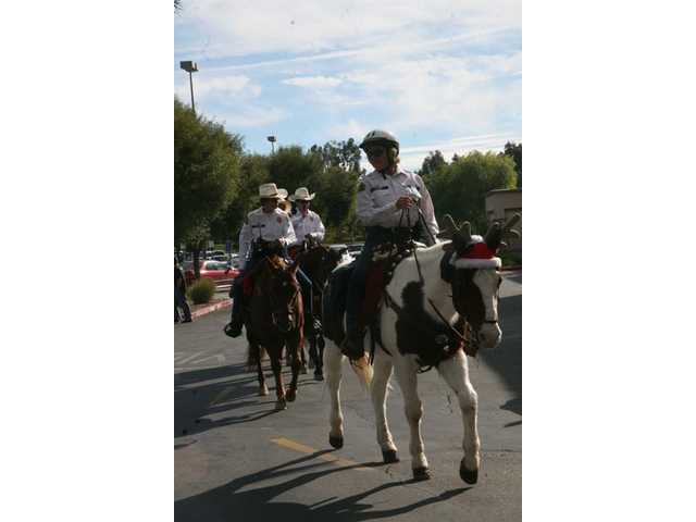 Horseback posse spreads smiles