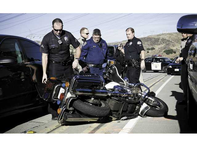 Cop goes down in crash