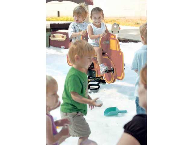 Creative Years Preschool enjoys a summer snow day