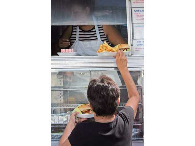 Grill celebrates 10 years with fundraiser