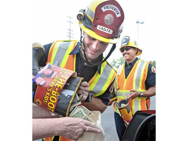 Firefighters pass the boot for Jerry’s Kids