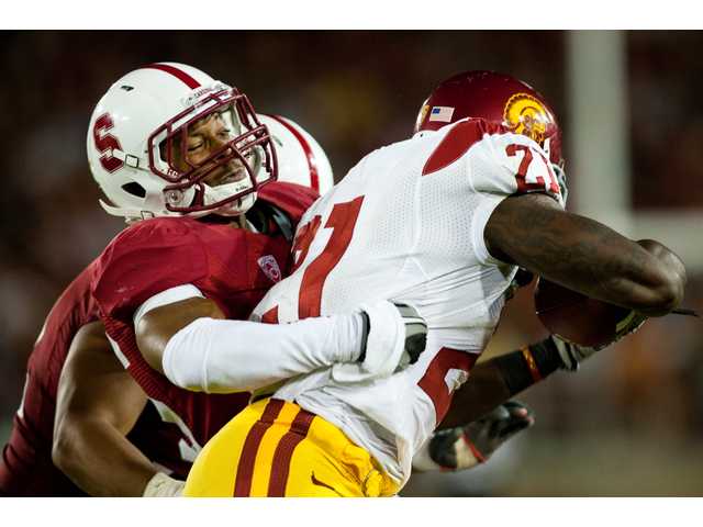 College football: Delano Howell, hitting and running