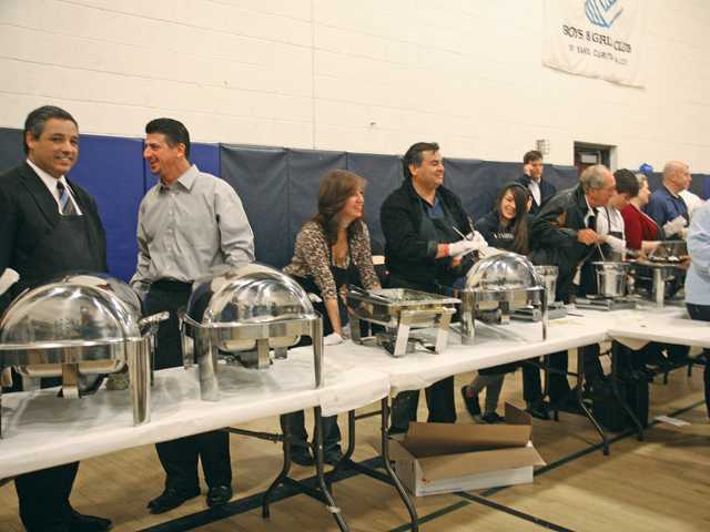 Auto dealers feed families in SCV 