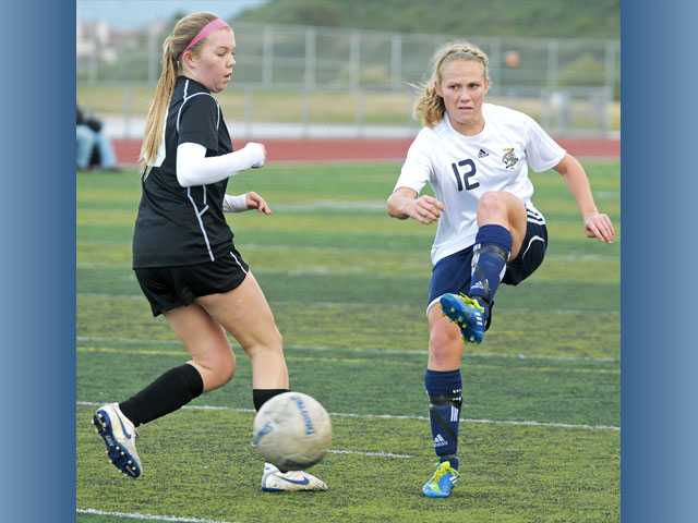 Prep soccer: West Ranch picks it up